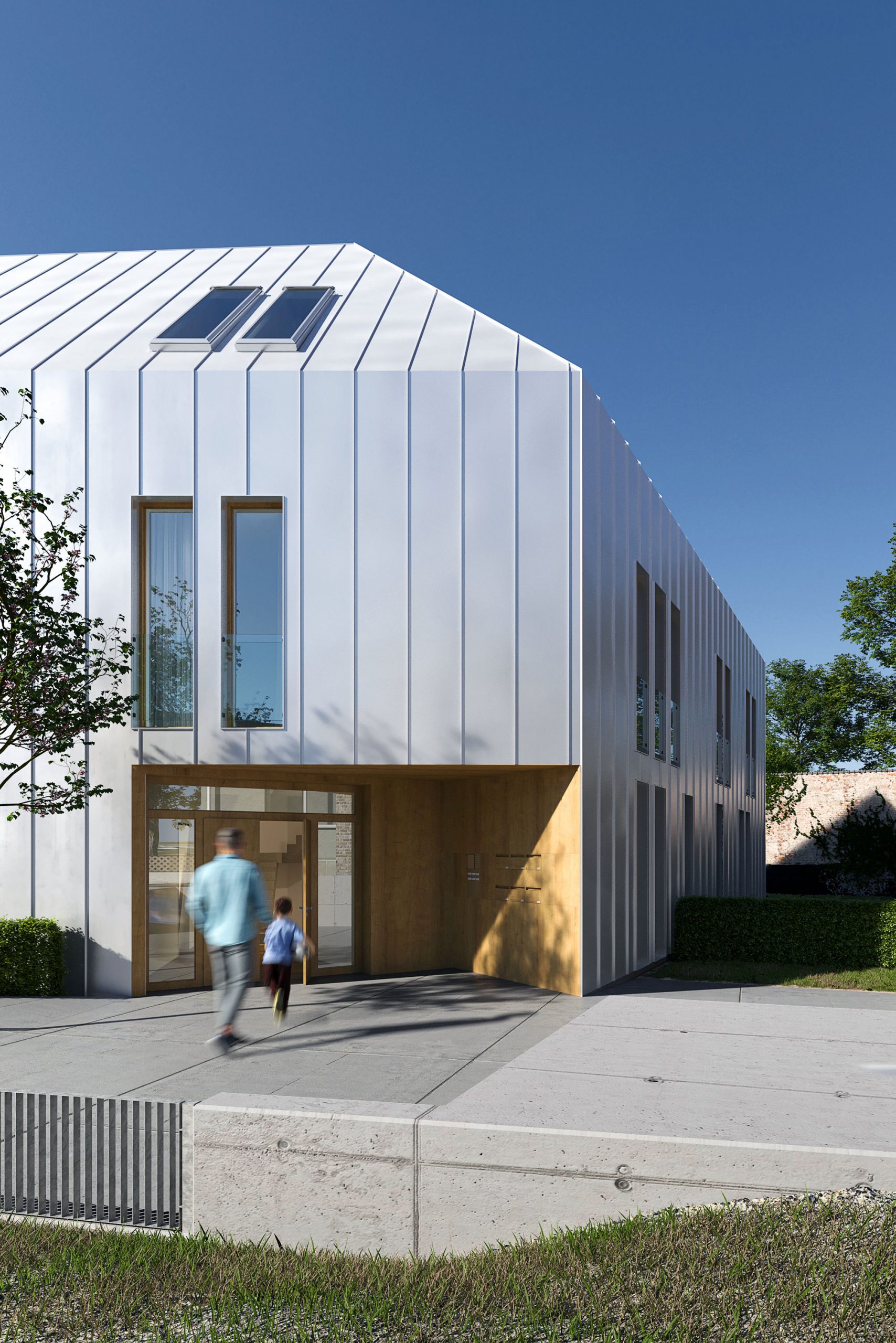 Perspektive von der Straße auf die Eingangsseite des Mehrfamilienhauses in der Oberpfalz.